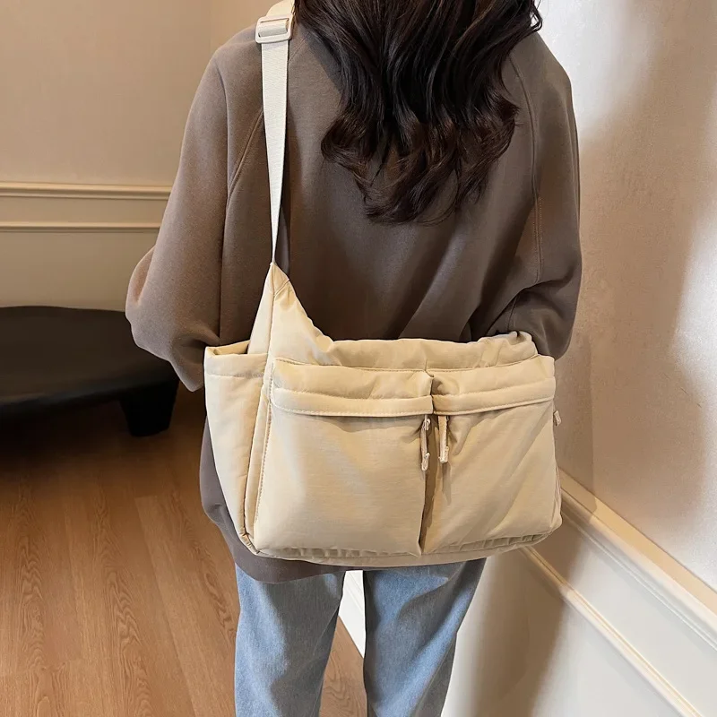 Work Style Casual Crossbody Bag with Large Capacity Waterproof Shoulder Bag Made of High-quality Nylon Fabric Bag for Men
Work Style Casual Crossbody Bag with Large Capacity Waterproof Shoulder Bag Made of High-quality Nylon Fabric Bag for Men