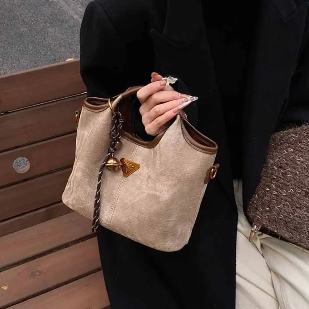 PU Vintage Tote Bag Small Triangle Brand Crossbody Bag Small Basket Bag With Pendant Korean Style Women's Shoulder Bag Girls
PU Vintage Tote Bag Small Triangle Brand Crossbody Bag Small Basket Bag With Pendant Korean Style Women's Shoulder Bag Girls