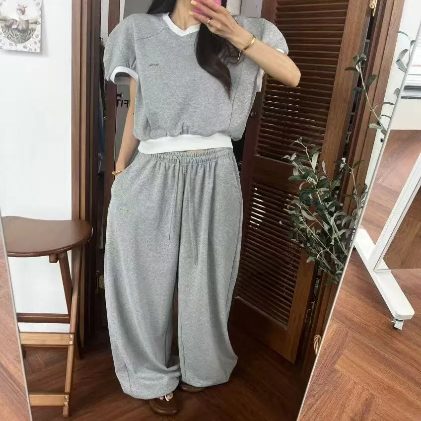 Summer 2026 Chic Loose Casual Short Sleeve Top And High Waist Wide Leg Pants Set Fashionable Versatile Korean Style Ensemble
Summer 2026 Chic Loose Casual Short Sleeve Top And High Waist Wide Leg Pants Set Fashionable Versatile Korean Style Ensemble