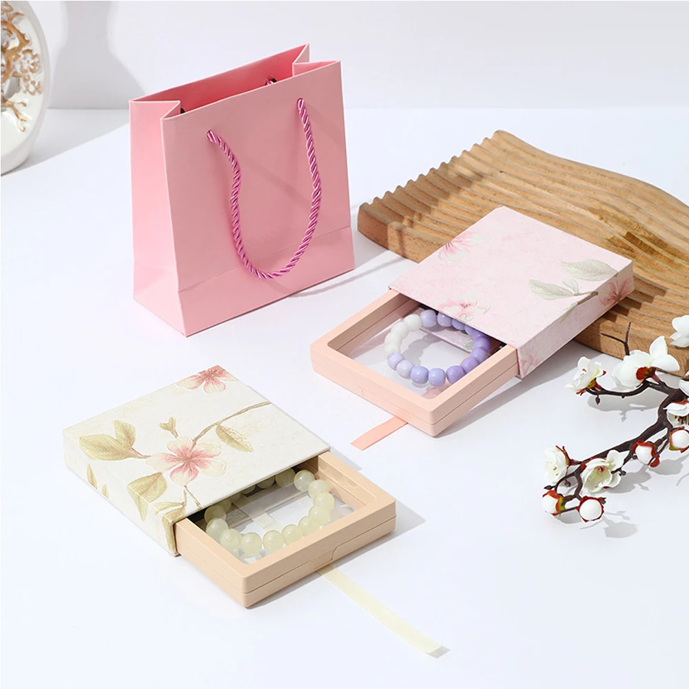 24Pcs Transparent PE Film Elastic Jewelry Box Brooch Ring Earring Bracelet Necklace Packaging Storage Hair Clip Badge Dustproof
24Pcs Transparent PE Film Elastic Jewelry Box Brooch Ring Earring Bracelet Necklace Packaging Storage Hair Clip Badge Dustproof