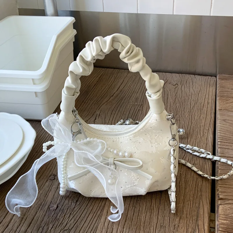 Bowknot Detail White Dumpling Bag 2025, Summer Niche, Women's Small Handheld/Crossbody, Elegant Chic 
Bowknot Detail White Dumpling Bag 2025, Summer Niche, Women's Small Handheld/Crossbody, Elegant Chic