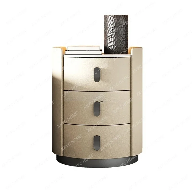 Italian minimalist bedside table simple modern light luxury high-end solid wood rock slab bedside storage round cabinet
Italian minimalist bedside table simple modern light luxury high-end solid wood rock slab bedside storage round cabinet