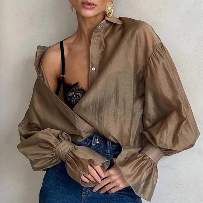 Elegant Lapel Collar Thin Temperament Shirts Women Casual Flared Sleeve Solid Color Commuter Tops Fashion Buttons Loose Blouse
Elegant Lapel Collar Thin Temperament Shirts Women Casual Flared Sleeve Solid Color Commuter Tops Fashion Buttons Loose Blouse