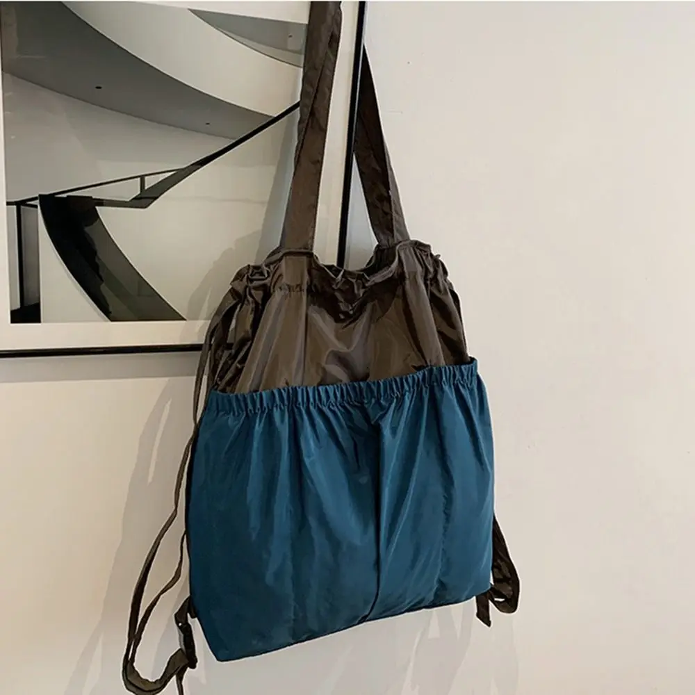 Large Capacity Foldable Backpack Reusable Patchwork Color Clash Travel Drawstring Bag Multi-functional Eco-Friendly
Large Capacity Foldable Backpack Reusable Patchwork Color Clash Travel Drawstring Bag Multi-functional Eco-Friendly