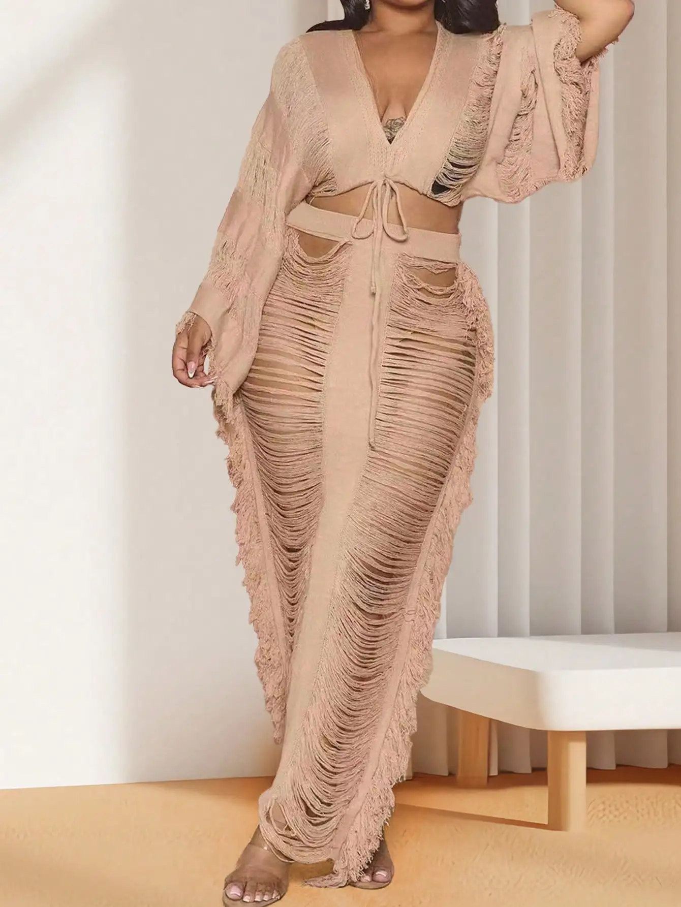 Women's Crochet Two-Piece Set with Tassel Detail V-Neck Crop Top and Maxi Skirt
Women's Crochet Two-Piece Set with Tassel Detail V-Neck Crop Top and Maxi Skirt