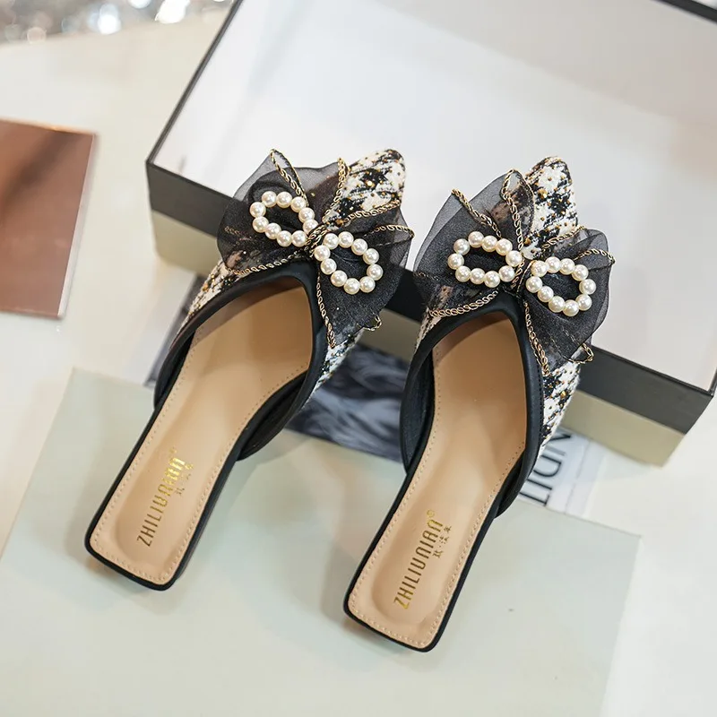 New Womens Shoes Luxury Imitation Pearl Bow Muller Slippers for Woman Fashion Vacation Casual Shoes Designer Shoes Zapatos Mujer
New Womens Shoes Luxury Imitation Pearl Bow Muller Slippers for Woman Fashion Vacation Casual Shoes Designer Shoes Zapatos Mujer
