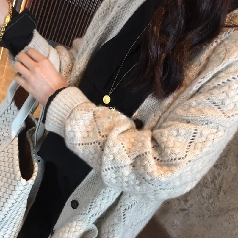 Elegant Hollow out Knitted Wool Sweater Outerwear Spring Autumn Long Loose Women's Cardigan Trendy Commute Style V-Neck Long ...
Elegant Hollow out Knitted Wool Sweater Outerwear Spring Autumn Long Loose Women's Cardigan Trendy Commute Style V-Neck Long ...