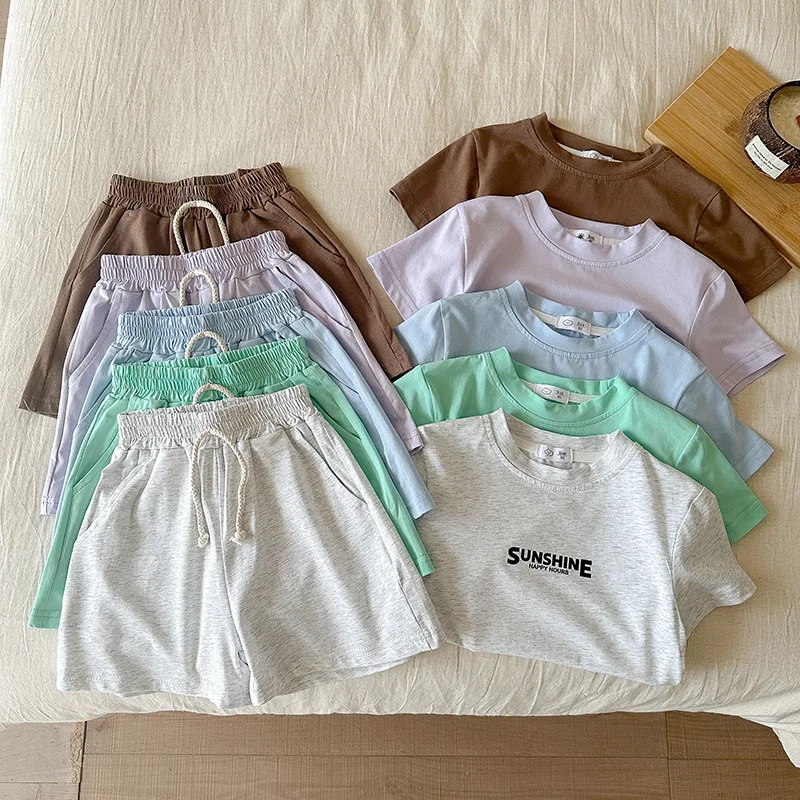 Новый летний комплект спортивной одежды для маленьких девочек, футболка с принтом букв + шорты, костюм из 2 предметов для мальчиков, повседневная одежда
Новый летний комплект спортивной одежды для маленьких девочек, футболка с принтом букв + шорты, костюм из 2 предметов для мальчиков, повседневная одежда