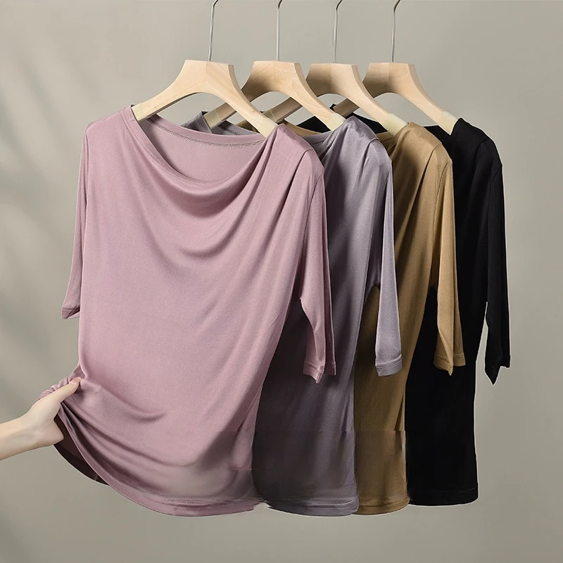 2025 New Mulberry Silk Swinging Neck Half Sleeve Top Design Sense Straight Tube Irregular T-shirt Solid Color Breathable Cloth
2025 New Mulberry Silk Swinging Neck Half Sleeve Top Design Sense Straight Tube Irregular T-shirt Solid Color Breathable Cloth