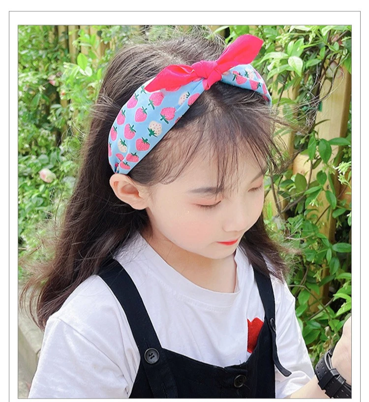 Children's headband fabric strawberry bow does not restrain the head baby girl cute pressure hair non-slip headband
Children's headband fabric strawberry bow does not restrain the head baby girl cute pressure hair non-slip headband
