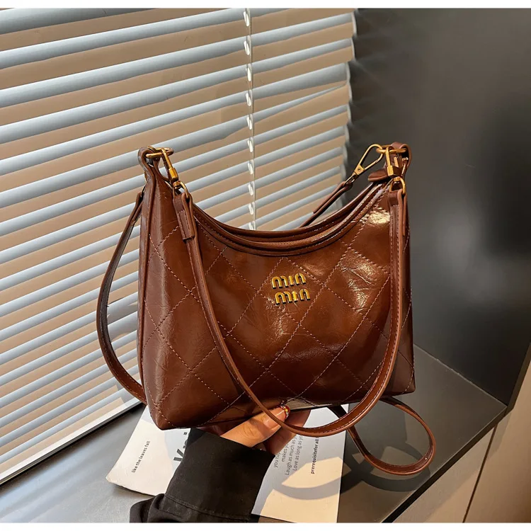 Нишевая стеганая сумка подмышки на цепочке 925, просторная женская сумка через плечо, шикарная сумка-тоут «день-ночь», повседневная сумка-слинг, минималистский стиль
Нишевая стеганая сумка подмышки на цепочке 925, просторная женская сумка через плечо, шикарная сумка-тоут «день-ночь», повседневная сумка-слинг, минималистский стиль