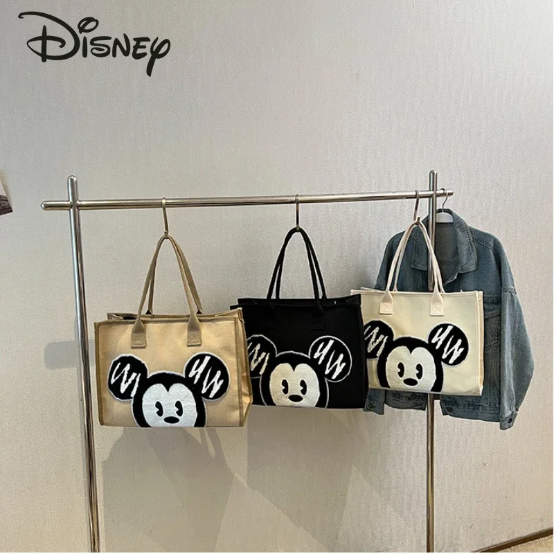 Новая женская сумка Disney с Микки, роскошная брендовая модная женская сумка через плечо, мультяшная Повседневная Универсальная женская сумка большой вместимости
Новая женская сумка Disney с Микки, роскошная брендовая модная женская сумка через плечо, мультяшная Повседневная Универсальная женская сумка большой вместимости