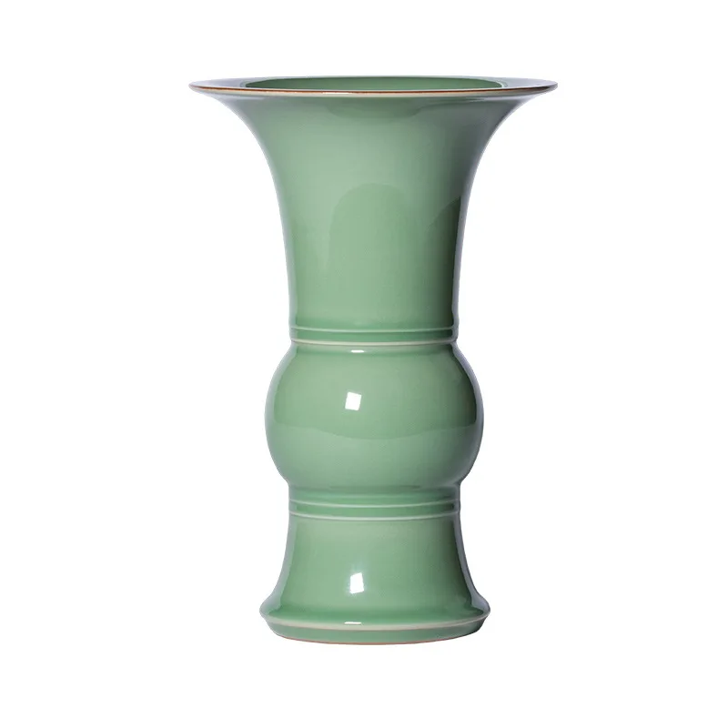 Celadon handmade vase retro high-end flower ware ceramic flower arrangement living room decoration ornament
Celadon handmade vase retro high-end flower ware ceramic flower arrangement living room decoration ornament