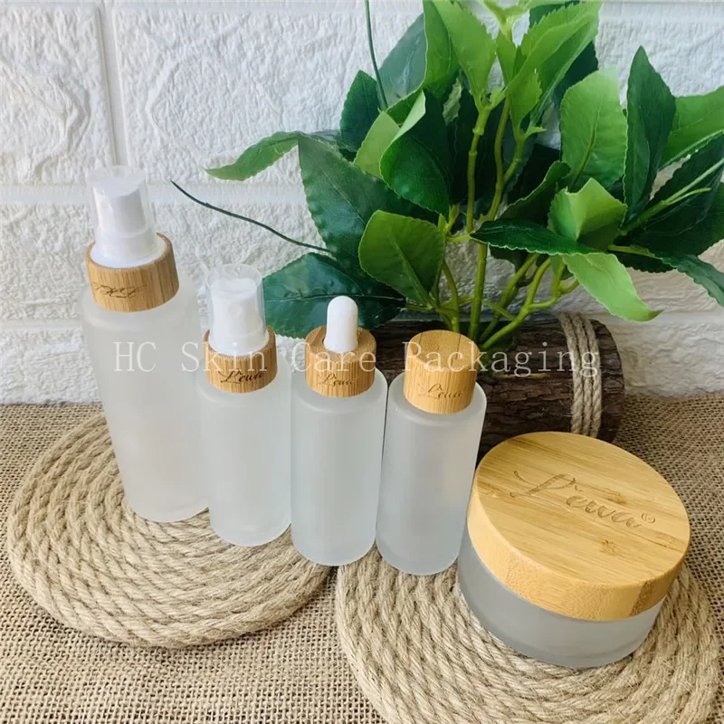 Engraving Logo Frosted Glass Bottles for Cosmetics Bottles with Bamboo Lid Covered spray bottle mist lotion bottles with pump
Engraving Logo Frosted Glass Bottles for Cosmetics Bottles with Bamboo Lid Covered spray bottle mist lotion bottles with pump