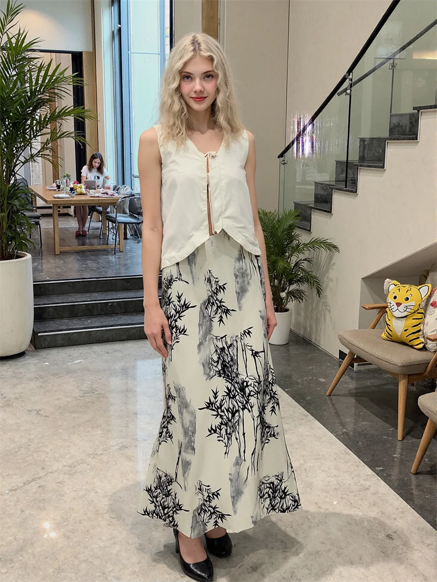 Юбки-миди в китайском стиле, женские плиссированные юбки с нерегулярными рюшами и эластичной резинкой на талии, многослойная сетка, шикарный клубный повседневный тренд, художественный
Юбки-миди в китайском стиле, женские плиссированные юбки с нерегулярными рюшами и эластичной резинкой на талии, многослойная сетка, шикарный клубный повседневный тренд, художественный