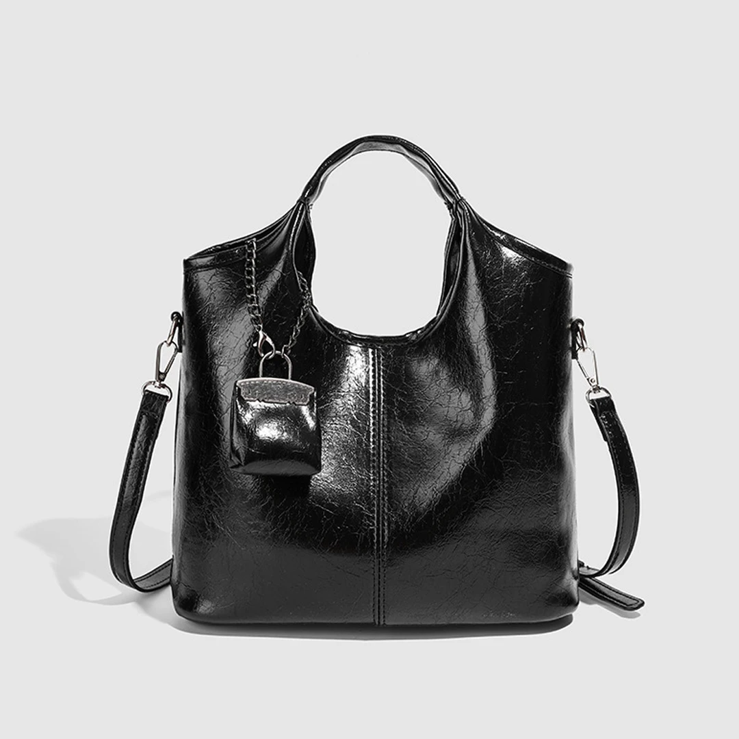 Fashion hanging accessory tote bag 2025 new style simple and elegant women's commuting handbag casual and versatile shoulder bag
Fashion hanging accessory tote bag 2025 new style simple and elegant women's commuting handbag casual and versatile shoulder bag