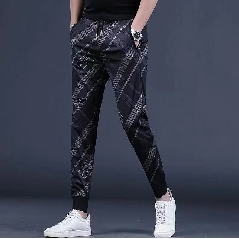 Повседневные мужские эластичные брюки с манжетами и принтом, весенне-осенние новые универсальные свободные брюки из полиэфирного волокна, молодежная повседневная одежда
Повседневные мужские эластичные брюки с манжетами и принтом, весенне-осенние новые универсальные свободные брюки из полиэфирного волокна, молодежная повседневная одежда