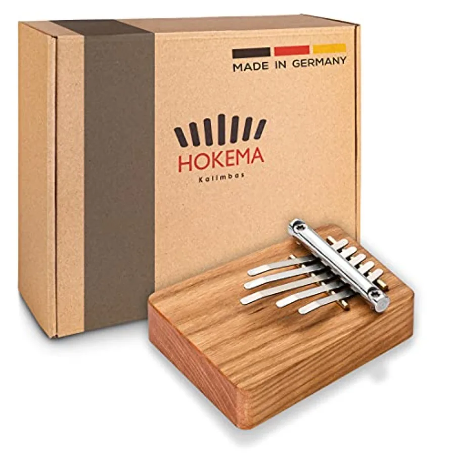 Kalimba B5 Pocket Thumb Piano for outdoor music practice, made of walnut wood, natural brown color, with smooth tines and porta
Kalimba B5 Pocket Thumb Piano for outdoor music practice, made of walnut wood, natural brown color, with smooth tines and porta