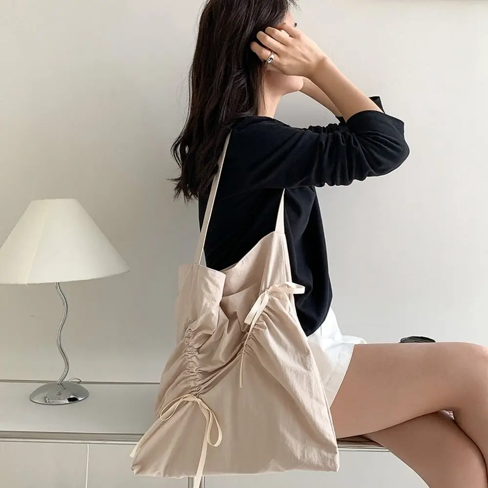 Cute Korean Style Bow Drawstring Bag Fold Commute Nylon Ruched Shoulder Bag Large Capacity Handbag Silver Tote Bag Women
Cute Korean Style Bow Drawstring Bag Fold Commute Nylon Ruched Shoulder Bag Large Capacity Handbag Silver Tote Bag Women