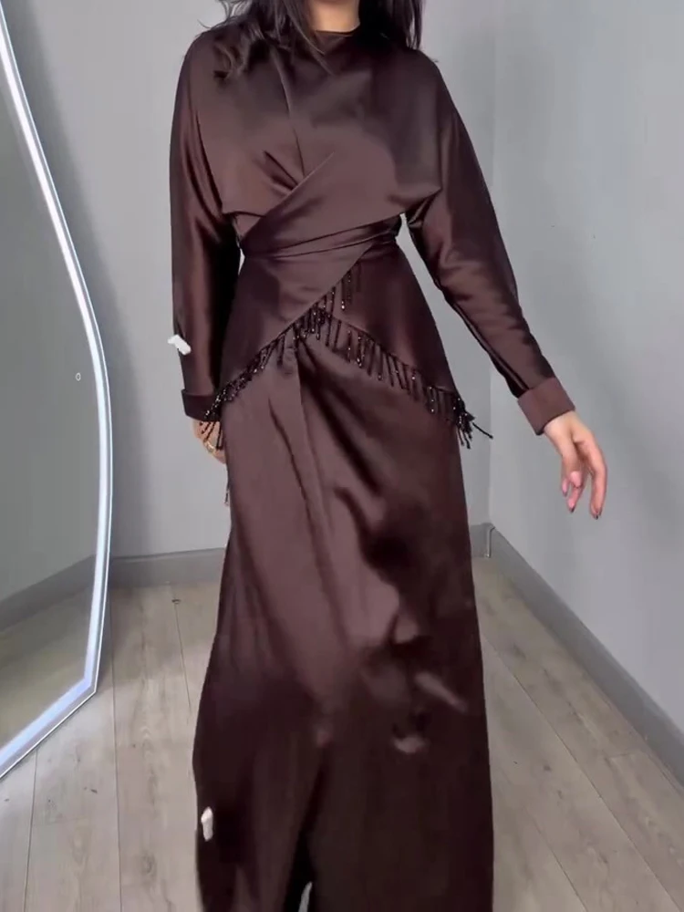 Модное платье-жилет с круглым вырезом и пуловер, топ, женский повседневный однотонный свободный костюм с длинными рукавами из 2 предметов, элегантная юбка с кисточками, наряды
Модное платье-жилет с круглым вырезом и пуловер, топ, женский повседневный однотонный свободный костюм с длинными рукавами из 2 предметов, элегантная юбка с кисточками, наряды