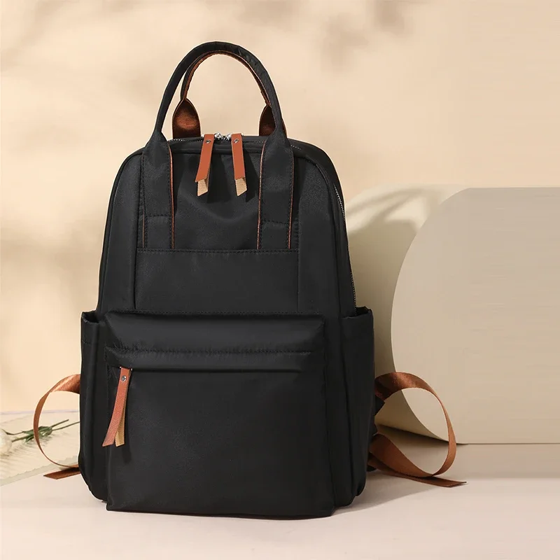 Nylon Solid Color 2024 Hot Selling Backpack Soft Back Air Cushion Belt Casual Backpack Soft Handle Large Capacity Handbag
Nylon Solid Color 2024 Hot Selling Backpack Soft Back Air Cushion Belt Casual Backpack Soft Handle Large Capacity Handbag