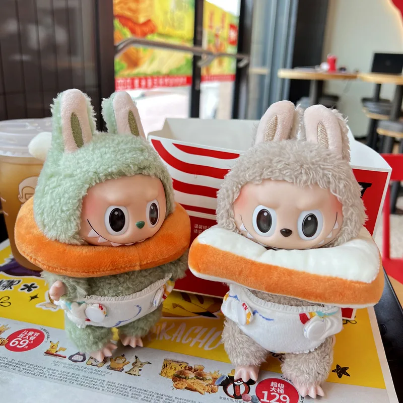 17cm Labubu doll Clothes Cartoon Tusi Chicken Leg Head Cover Diaper Pants Set Plush Keychain clothing Accessories
17cm Labubu doll Clothes Cartoon Tusi Chicken Leg Head Cover Diaper Pants Set Plush Keychain clothing Accessories