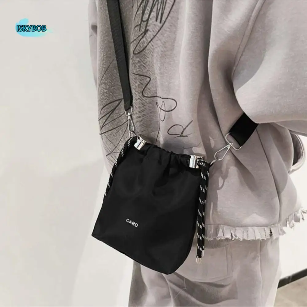 Simple Korean Style Black Drawstring Bucket Bag Portable Nylon INS Shoulder Bag Luxury Fashion Crossbody Bags Girls
Simple Korean Style Black Drawstring Bucket Bag Portable Nylon INS Shoulder Bag Luxury Fashion Crossbody Bags Girls