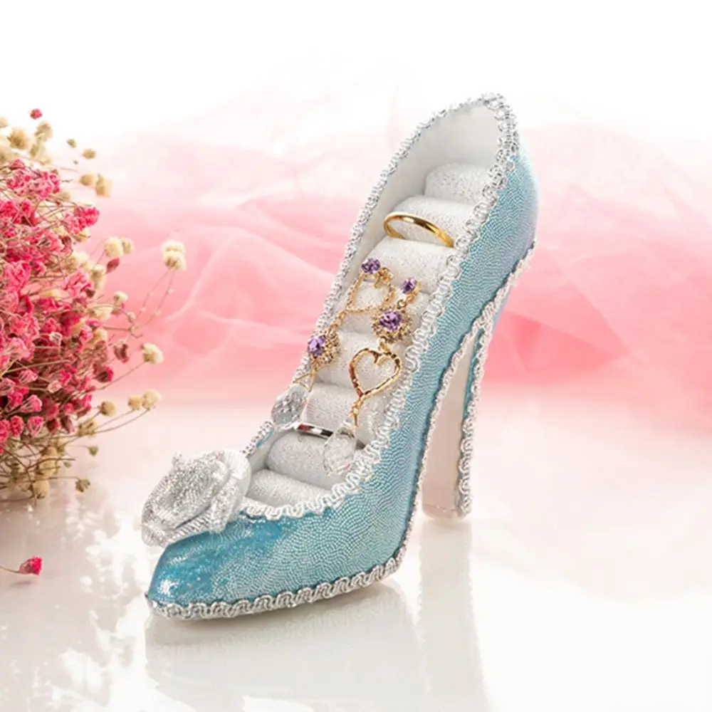 Элегантная подставка для демонстрации обуви на высоком каблуке, бархатных колец, ювелирных украшений, кружевных роз и серег
Элегантная подставка для демонстрации обуви на высоком каблуке, бархатных колец, ювелирных украшений, кружевных роз и серег