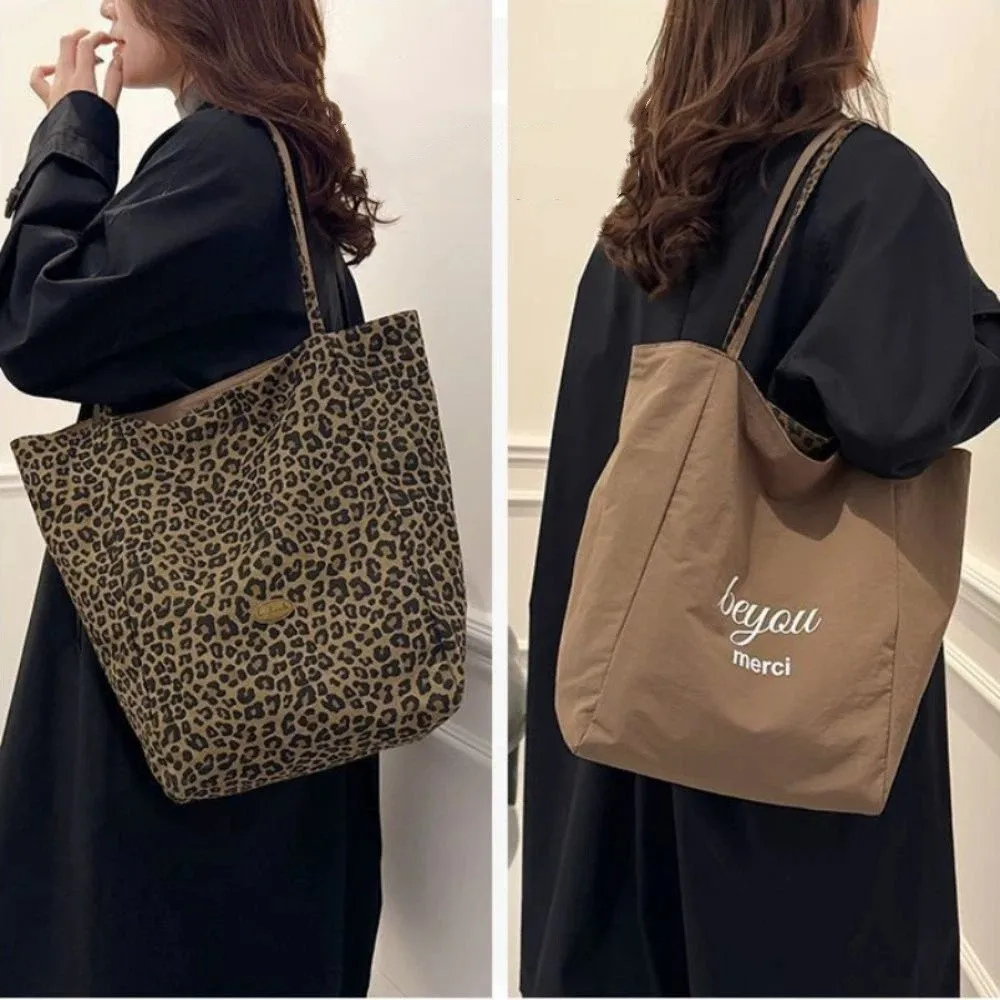 Fashion Double-Sided Leopard Print Bag Durable Versatile Canvas Bag Large Capacity Shoulder Bag Daily Use
Fashion Double-Sided Leopard Print Bag Durable Versatile Canvas Bag Large Capacity Shoulder Bag Daily Use