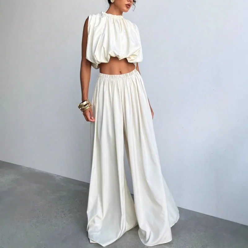 Новый летний модный однотонный плиссированный комплект со свободной талией и широкими брюками
Новый летний модный однотонный плиссированный комплект со свободной талией и широкими брюками