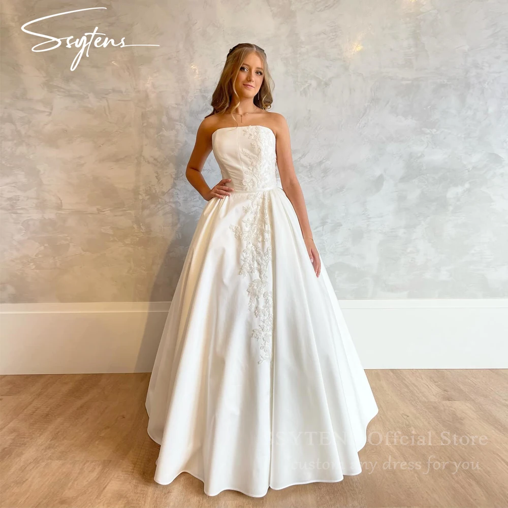 SSYTENS lvory Satin Wedding Dresses Strapless A Line Bridal Gowns Bow Back Women Appliques Elegant Floor Length Bride Dress 2025
SSYTENS lvory Satin Wedding Dresses Strapless A Line Bridal Gowns Bow Back Women Appliques Elegant Floor Length Bride Dress 2025