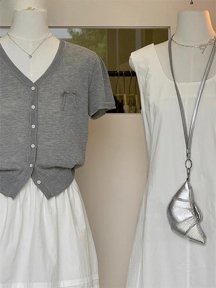 Корейский вязаный кардиган Sle Knot ey V-Ne ort Sve, женская летняя футболка маленького размера из ледяного шелка, топ
Корейский вязаный кардиган Sle Knot ey V-Ne ort Sve, женская летняя футболка маленького размера из ледяного шелка, топ