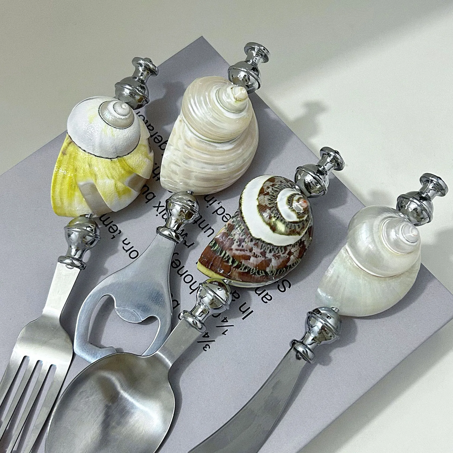 Natural Conch Shell Dessert Fork Stainless Steel Flatware Kitchen Utensils Set Pearl Snail Fork Spoon Tableware Bottle Opener
Natural Conch Shell Dessert Fork Stainless Steel Flatware Kitchen Utensils Set Pearl Snail Fork Spoon Tableware Bottle Opener