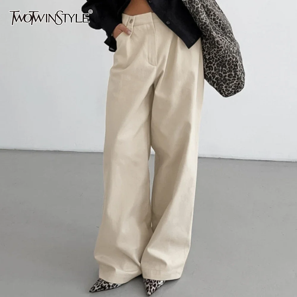 TWOTWINSTYLE Solid Spliced Button Loose Pants for Women High Waist Temperament Wide Leg Pant Female Fashion Style New
TWOTWINSTYLE Solid Spliced Button Loose Pants for Women High Waist Temperament Wide Leg Pant Female Fashion Style New