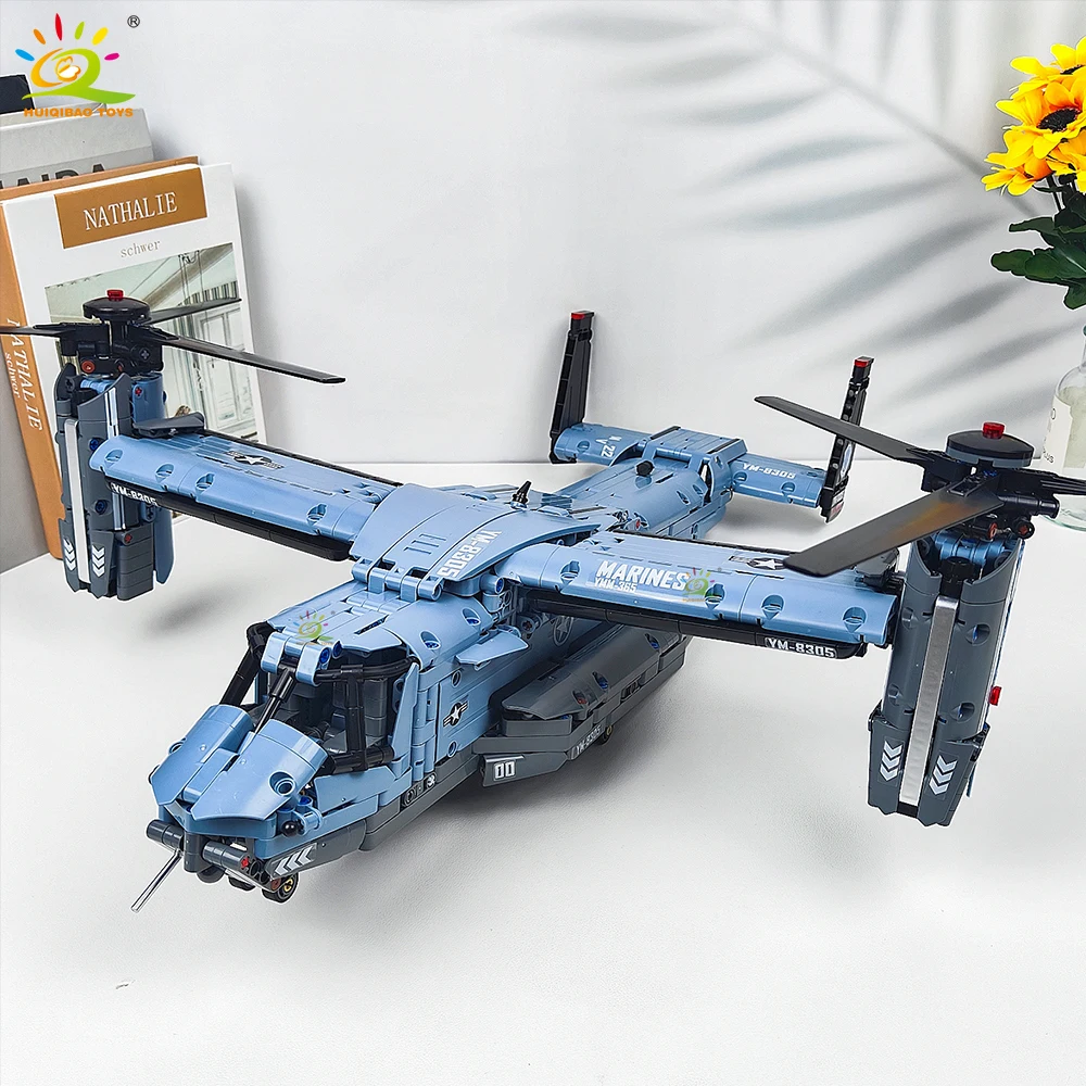 HUIQIBAO MOC 1389PCS V-22 Tiltrotor Aircraft Helicopter Building Block Children Military Airplane model Bricks Toy home Decor.
HUIQIBAO MOC 1389PCS V-22 Tiltrotor Aircraft Helicopter Building Block Children Military Airplane model Bricks Toy home Decor.