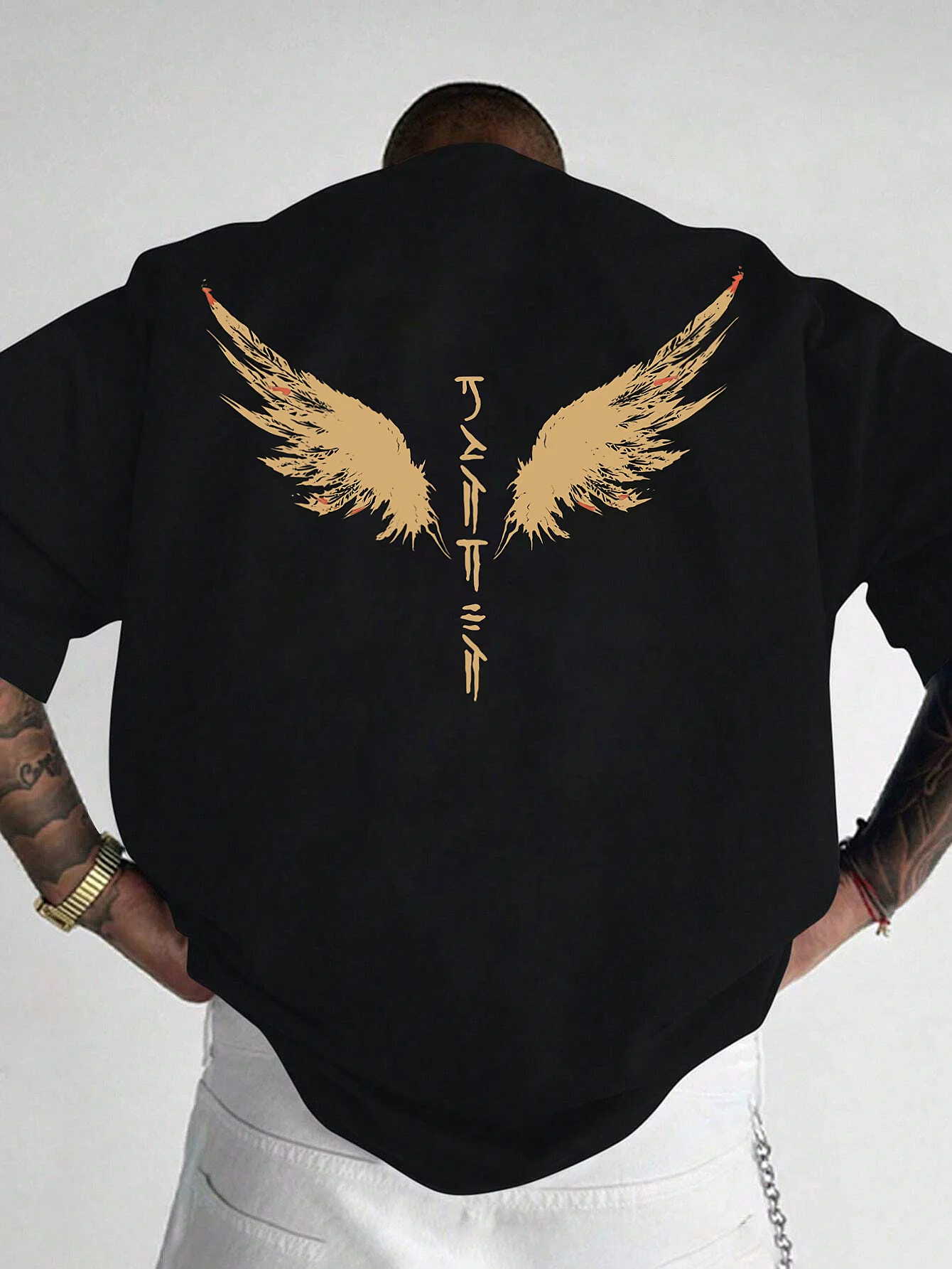 Mens Oversized Black T Shirt with Gold Angel Wing Graphic Urban Streetwear Gothic Style Hip Hop Fashion Summer Casual Top Tee
Mens Oversized Black T Shirt with Gold Angel Wing Graphic Urban Streetwear Gothic Style Hip Hop Fashion Summer Casual Top Tee