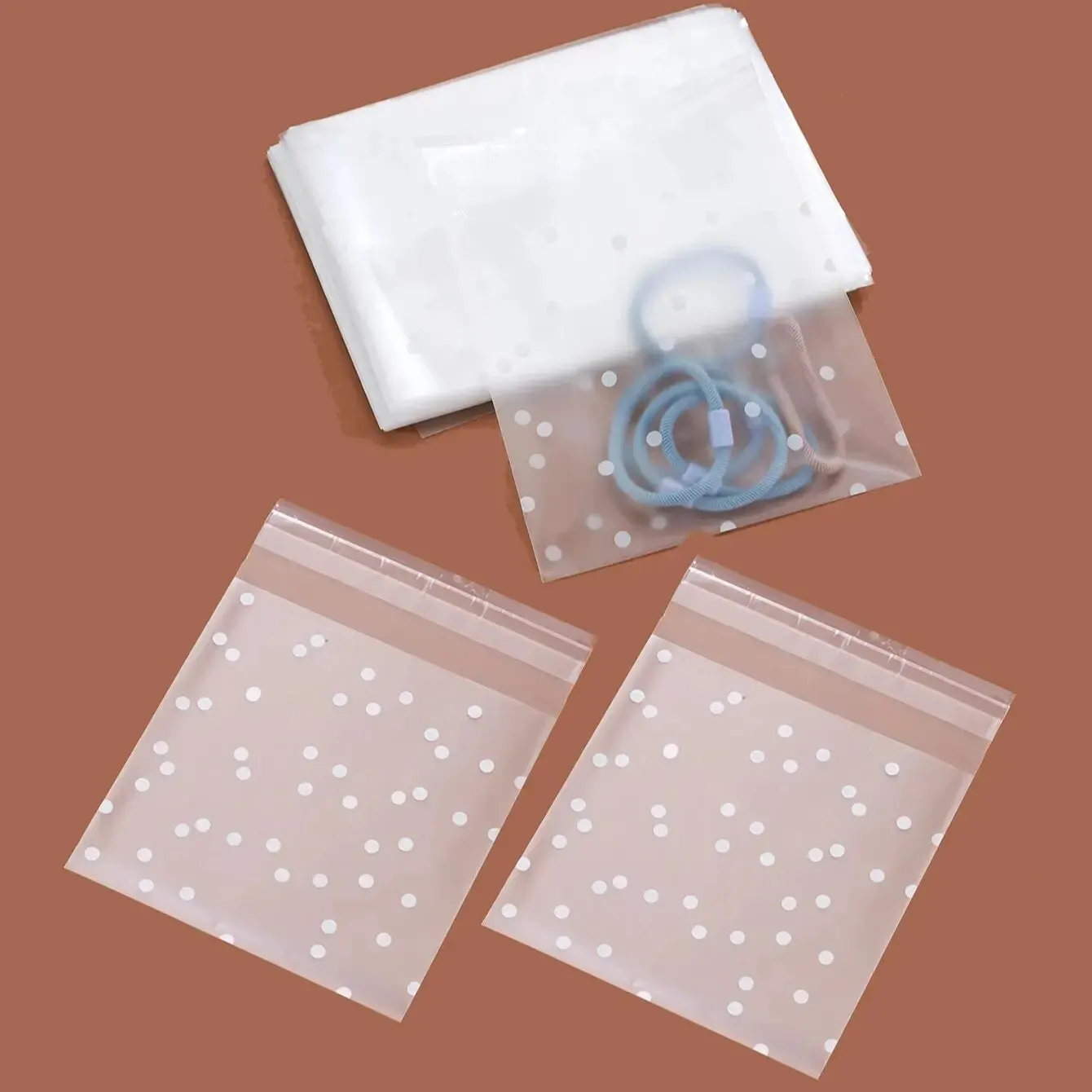 100pcs Plastic Transparent Packaging Cellophane Bags White Snowflake Dot Gift Bag DIY Self Adhesive Candy Cookie Pouch for Party
100pcs Plastic Transparent Packaging Cellophane Bags White Snowflake Dot Gift Bag DIY Self Adhesive Candy Cookie Pouch for Party