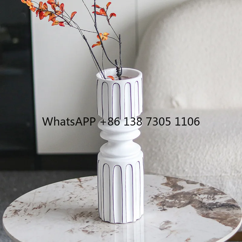 Modern European black and white striped vase ornament simple home decoration desktop porch TV cabinet Roman column flower ware
Modern European black and white striped vase ornament simple home decoration desktop porch TV cabinet Roman column flower ware