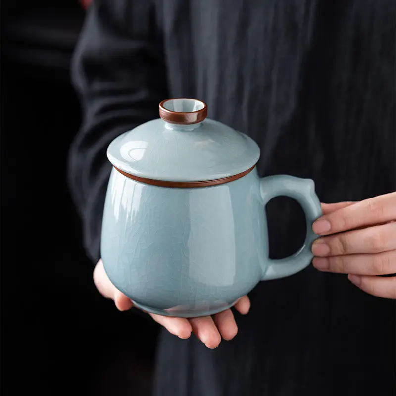 Ru kiln Tianqing office cup tea separation with lid ceramic tea cup filter tea cup company business gift
Ru kiln Tianqing office cup tea separation with lid ceramic tea cup filter tea cup company business gift