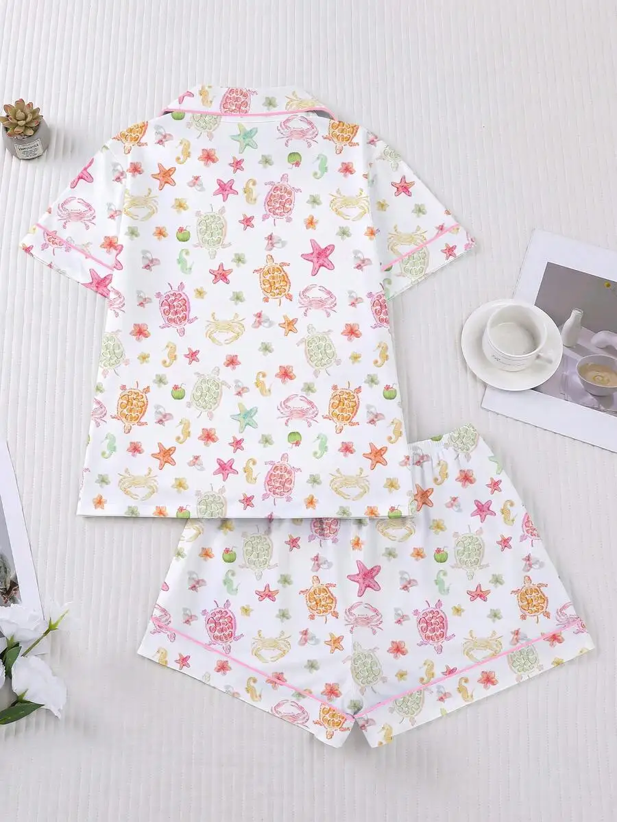 Womens 2-Piece Pajama Set With Ocean Creature Print, Short Sleeve Shirt Collar Top And Elastic Waist Shorts
Womens 2-Piece Pajama Set With Ocean Creature Print, Short Sleeve Shirt Collar Top And Elastic Waist Shorts