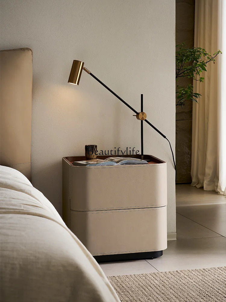 Minimalist saddle leather bedside table modern household small apartment multi-functional solid wood
Minimalist saddle leather bedside table modern household small apartment multi-functional solid wood