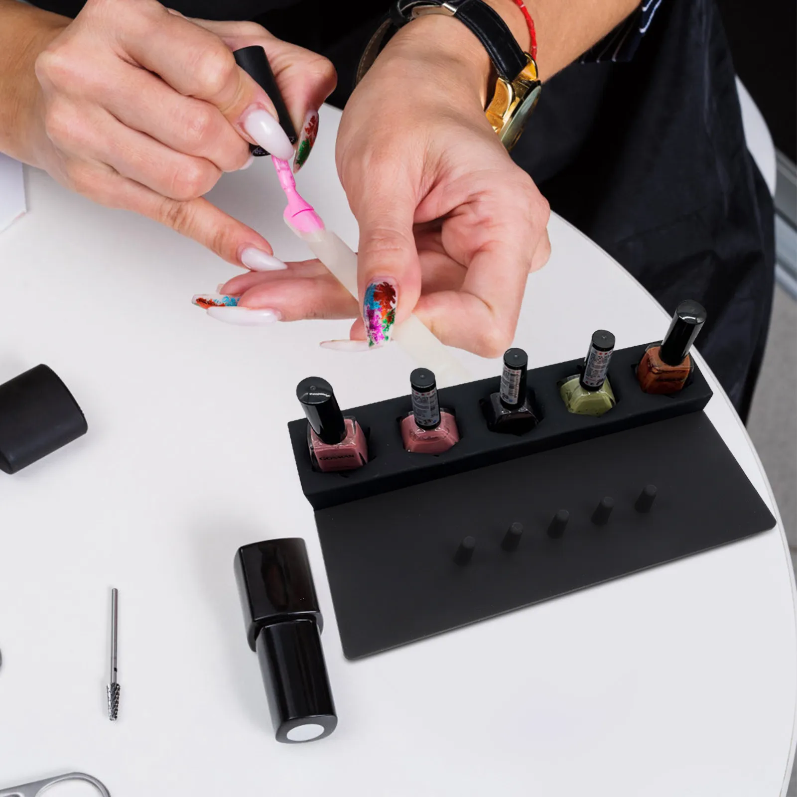 Silicone Nail Polish Holding Rack with Five Stands for Drip Free Polishing and Finger Positioning Manicure Accessory for Salon
Silicone Nail Polish Holding Rack with Five Stands for Drip Free Polishing and Finger Positioning Manicure Accessory for Salon