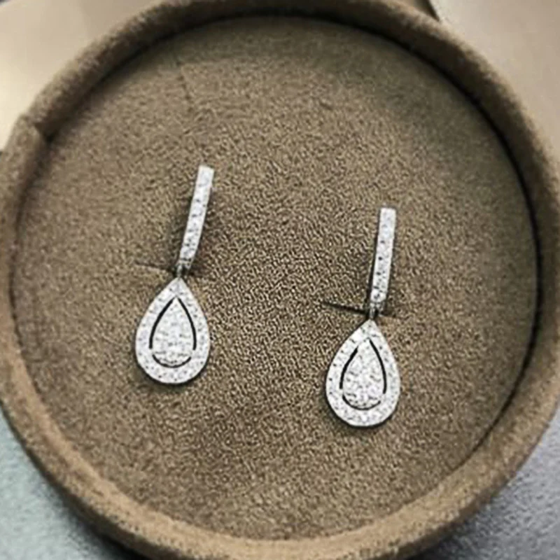 Huitan Silver Color Pear Shaped Drop Earrings for Women Full Paved White Cubic Zirconia Delicate Girl Earrings Statement Jewelry
Huitan Silver Color Pear Shaped Drop Earrings for Women Full Paved White Cubic Zirconia Delicate Girl Earrings Statement Jewelry