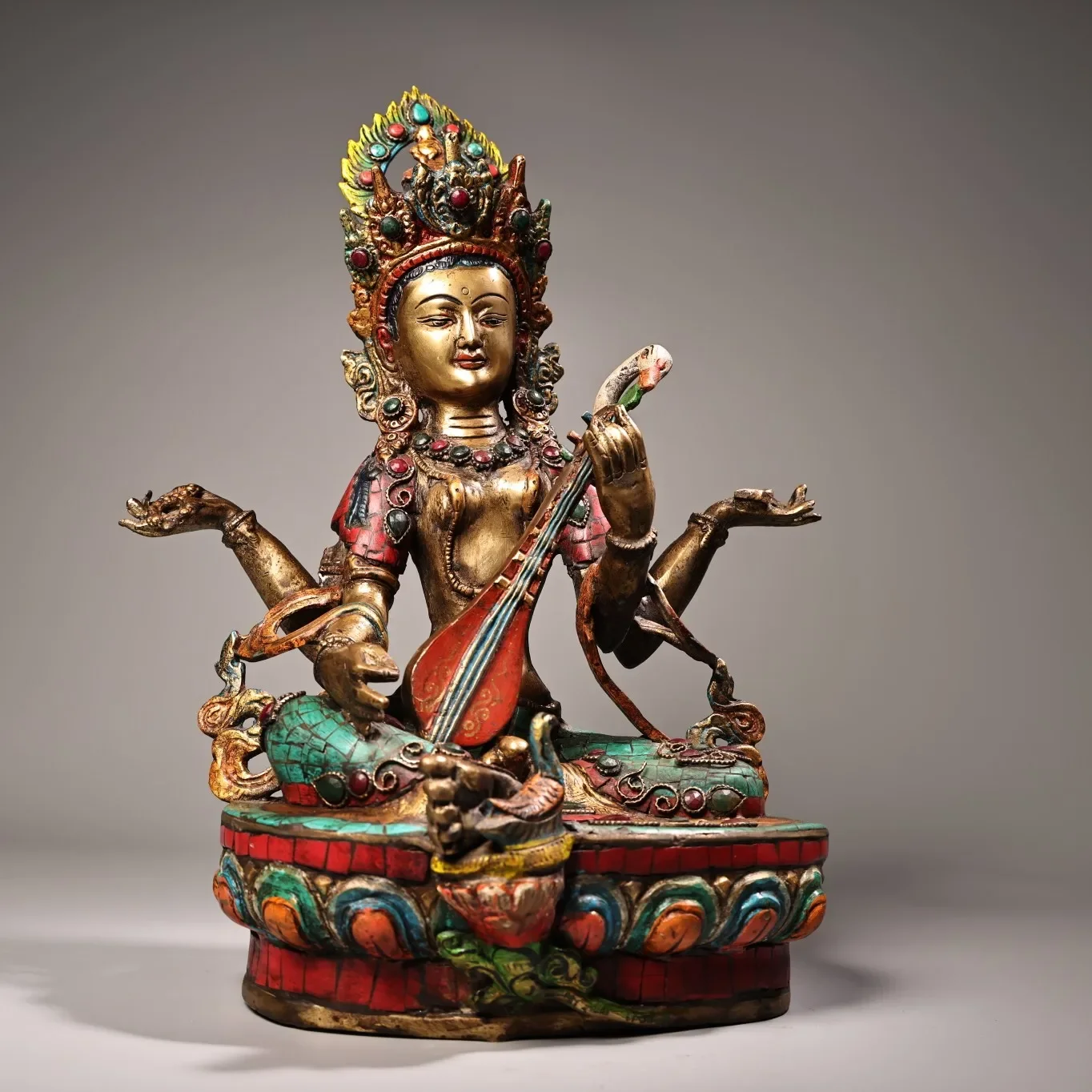 14"Tibetan Temple Collection Old Bronze Outline in gold Mosaic Gem Four armed Sarasvati Sitting Buddha Worship Hall
14"Tibetan Temple Collection Old Bronze Outline in gold Mosaic Gem Four armed Sarasvati Sitting Buddha Worship Hall