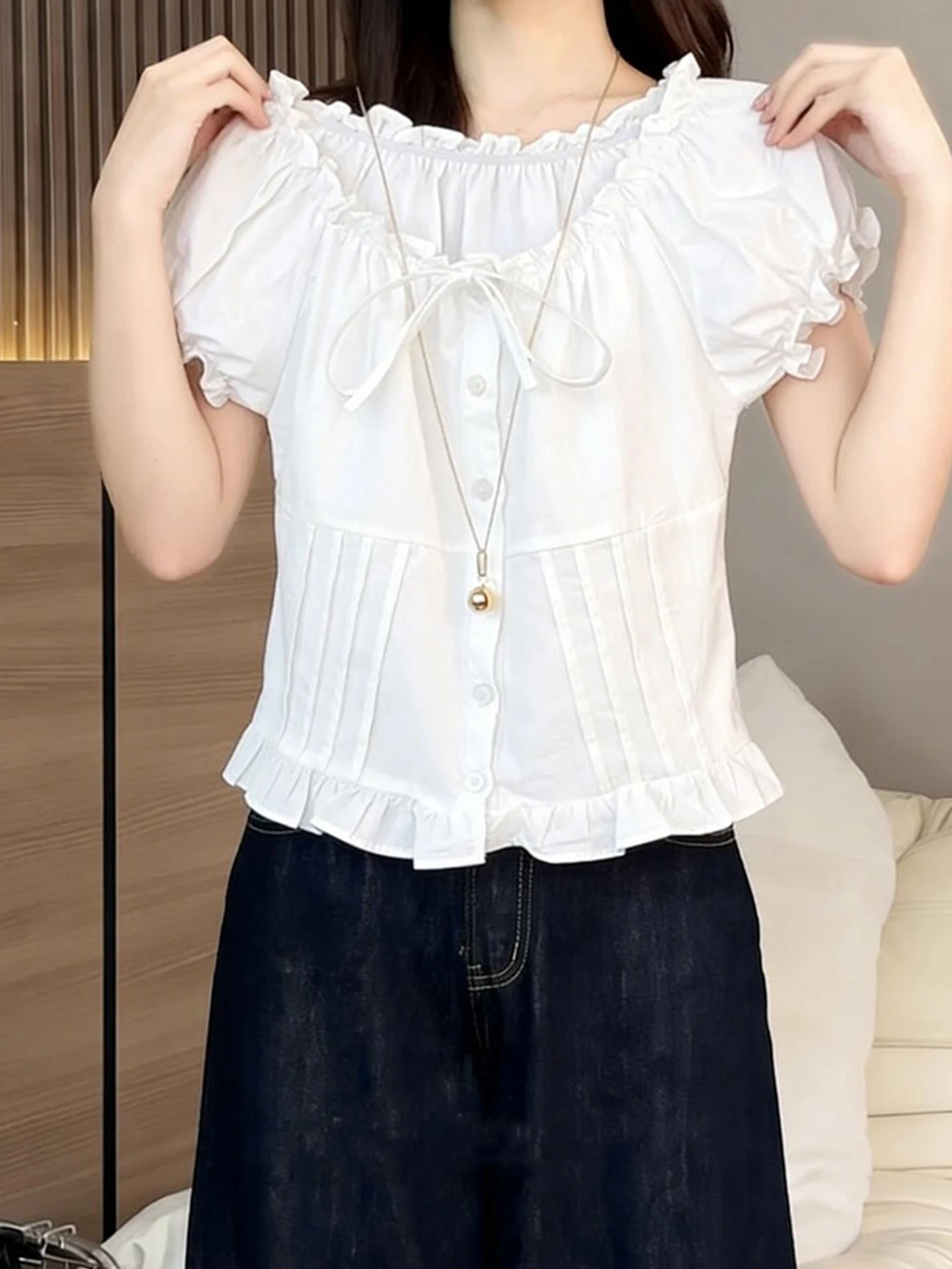 Elegant Sweet Style Shirt Bow Tie Bubble Sleeve 2026 Summer White Single Button Anti Aging Top Women's Fashion Korean Version
Elegant Sweet Style Shirt Bow Tie Bubble Sleeve 2026 Summer White Single Button Anti Aging Top Women's Fashion Korean Version