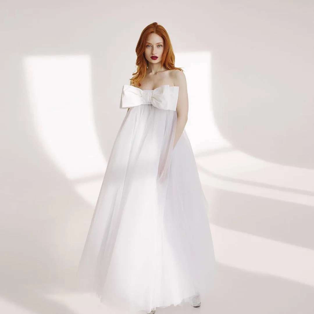 Simple White Strapless Tulle Bridal Dresses Fashion Bow A Line Draped Long Bride Dress Ankle Length vestidos de novia 2024
Simple White Strapless Tulle Bridal Dresses Fashion Bow A Line Draped Long Bride Dress Ankle Length vestidos de novia 2024