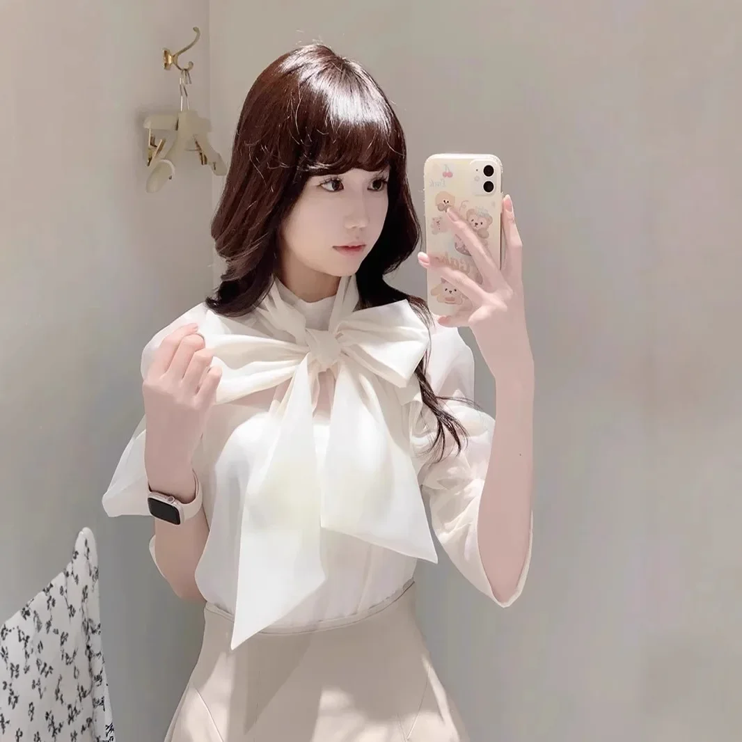 Early spring Japanese sisters new polka dot bow strap bubble sleeve shirt top
Early spring Japanese sisters new polka dot bow strap bubble sleeve shirt top