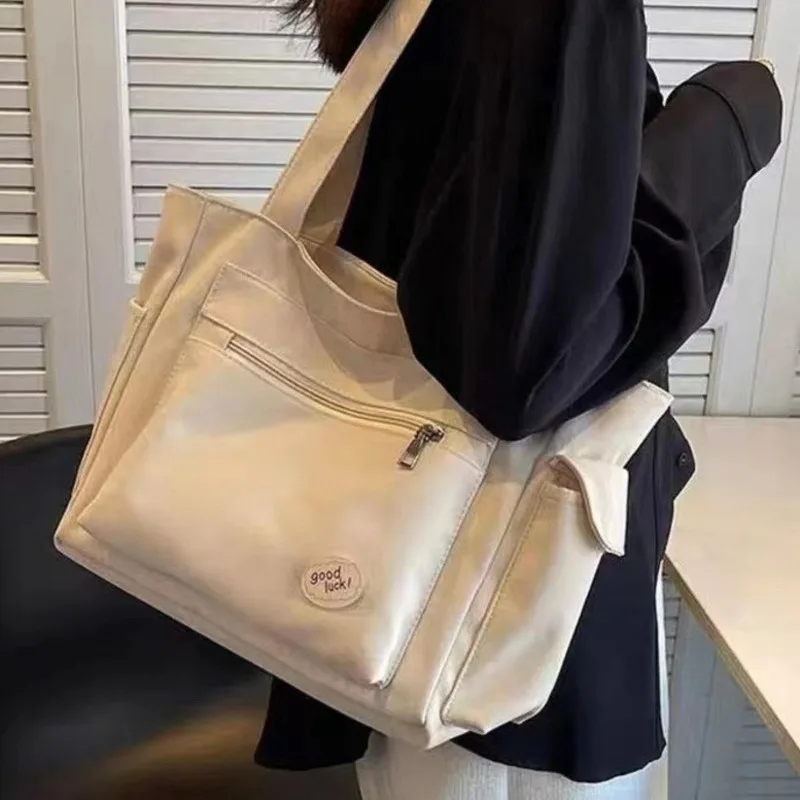 2024 New Women's Large Capacity Canvas Student Multi functional Handbag, Crossbody Bag, Shoulder Bag
2024 New Women's Large Capacity Canvas Student Multi functional Handbag, Crossbody Bag, Shoulder Bag