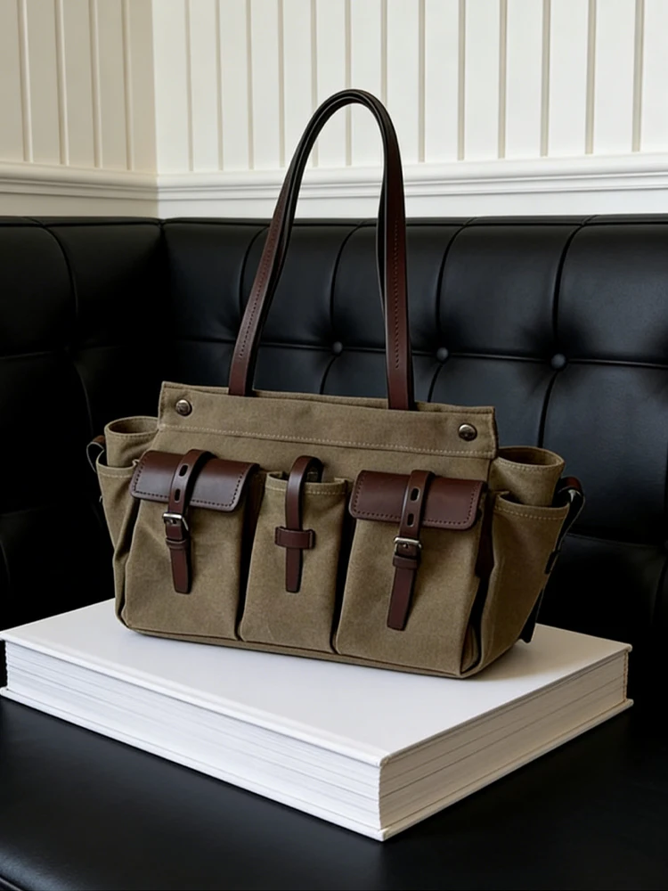 Military Green Commuter Retro Multi-Pocket Canvas Tote Bag Women's 2026 New Large Capacity Single Shoulder Armpit Bag
Military Green Commuter Retro Multi-Pocket Canvas Tote Bag Women's 2026 New Large Capacity Single Shoulder Armpit Bag