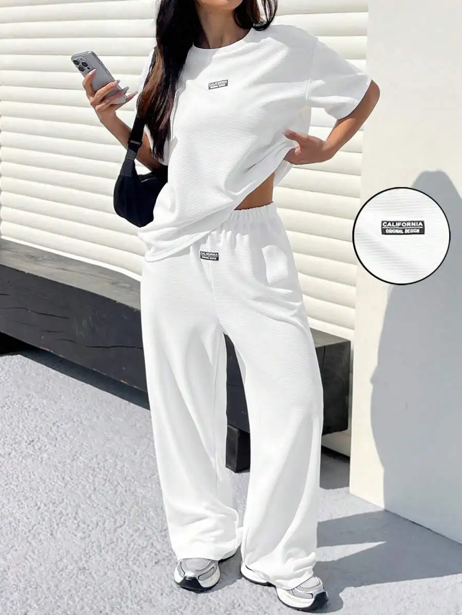 White Textured Casual Loose T-Shirt And Pants Set For Women
White Textured Casual Loose T-Shirt And Pants Set For Women